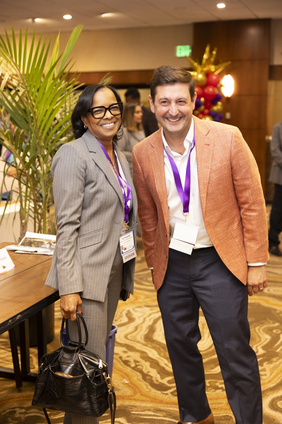 Attendees in the networking lounge